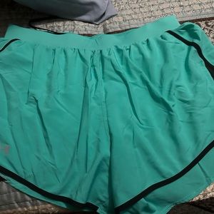 Under Armour 2x teal shorts.  Never worn.